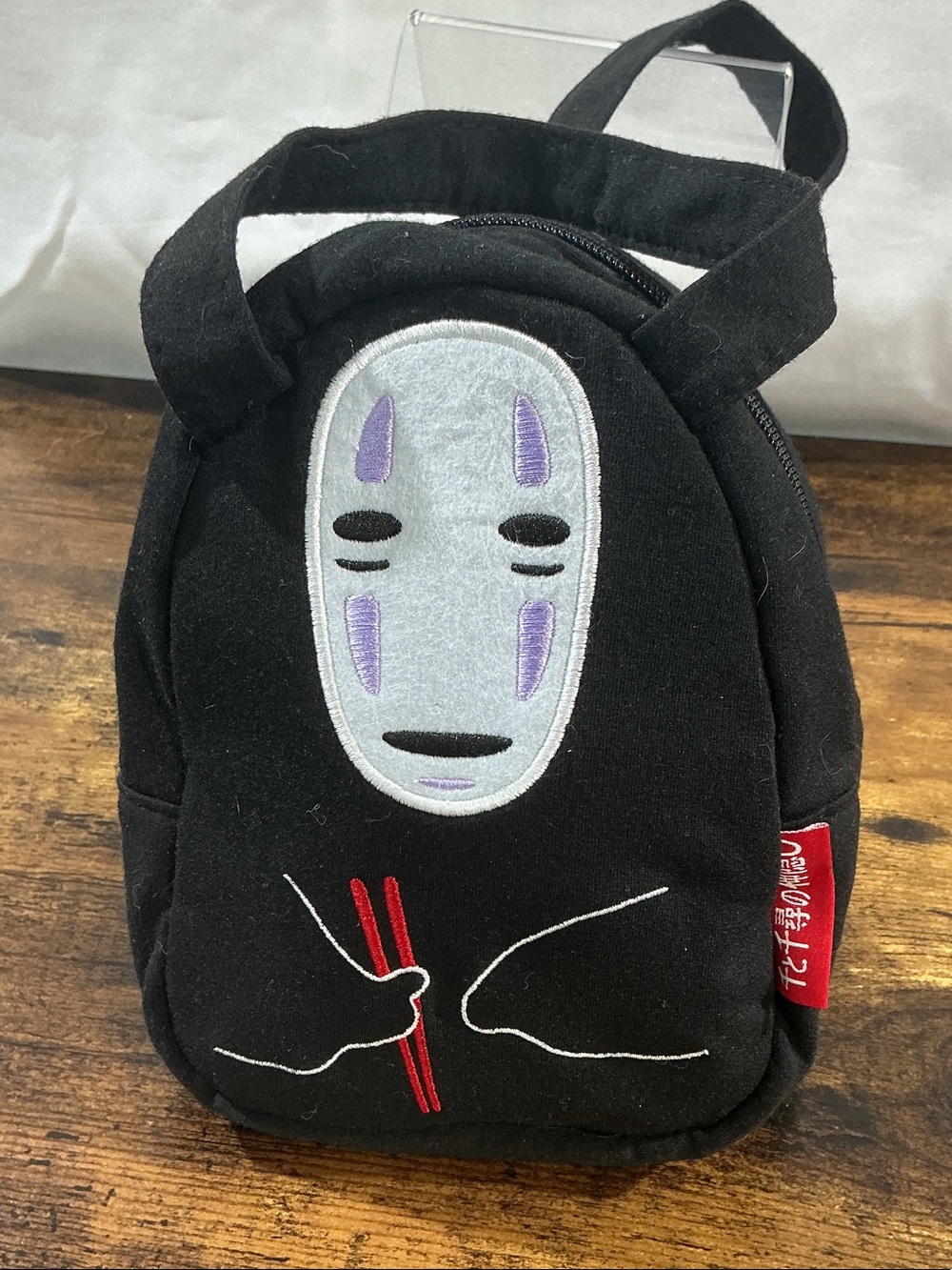 Spirited Away No-Face character and chopsticks